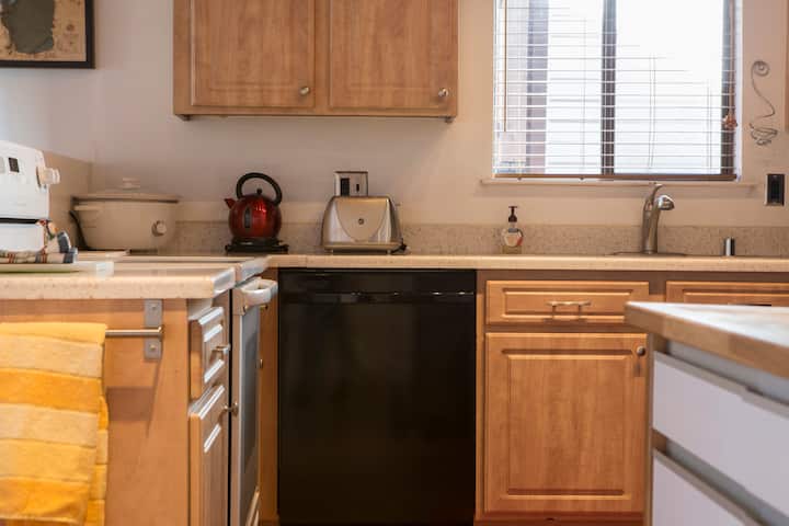 Full kitchen with double fridge freezer and worktop space