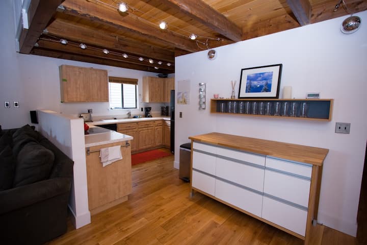 Kitchen with a double fridge freezer and full worktop