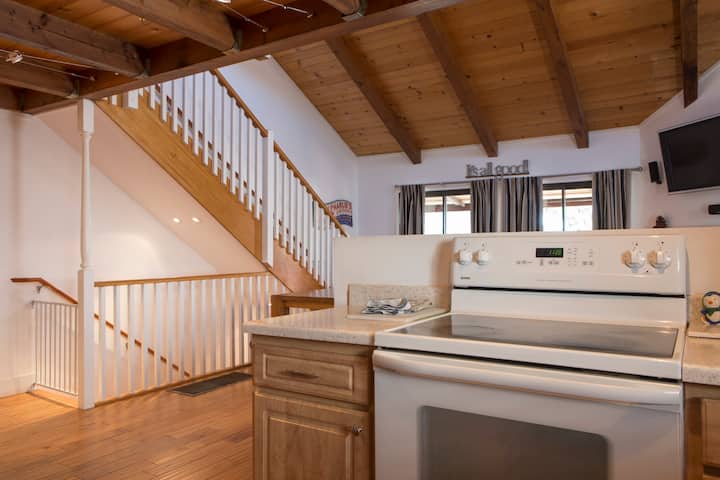 View from the kitchen through to the dining and living room area